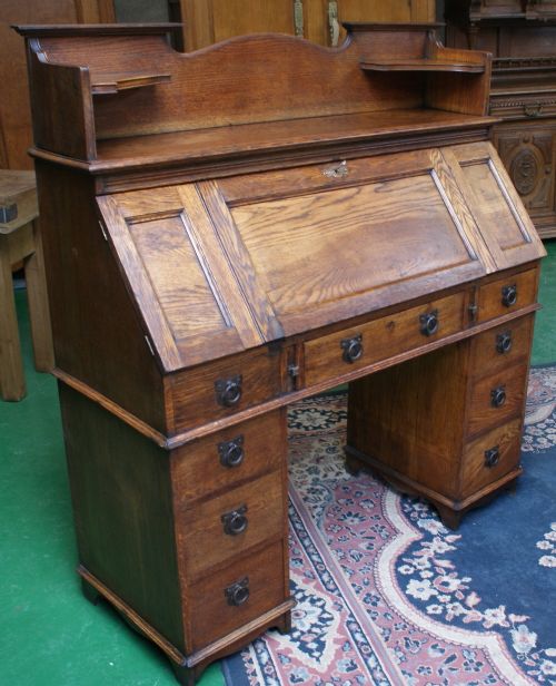 an early 20th century solid oak britisher arts crafts writing desk