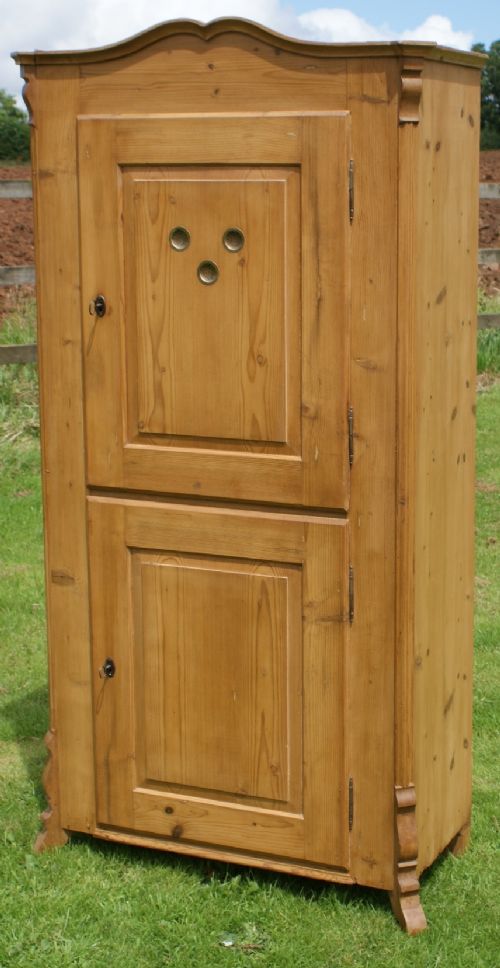 a beautiful east german stripped pine food cupboard with inside drawer