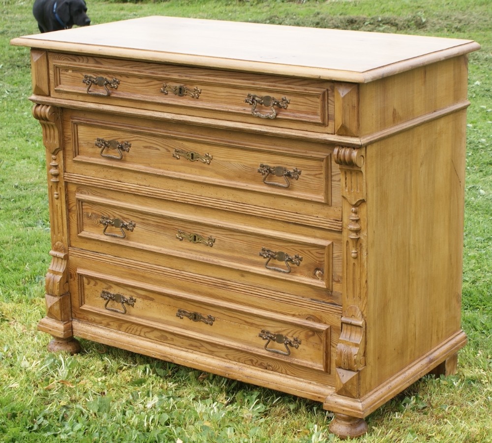 a fine german stripped chest of drawers
