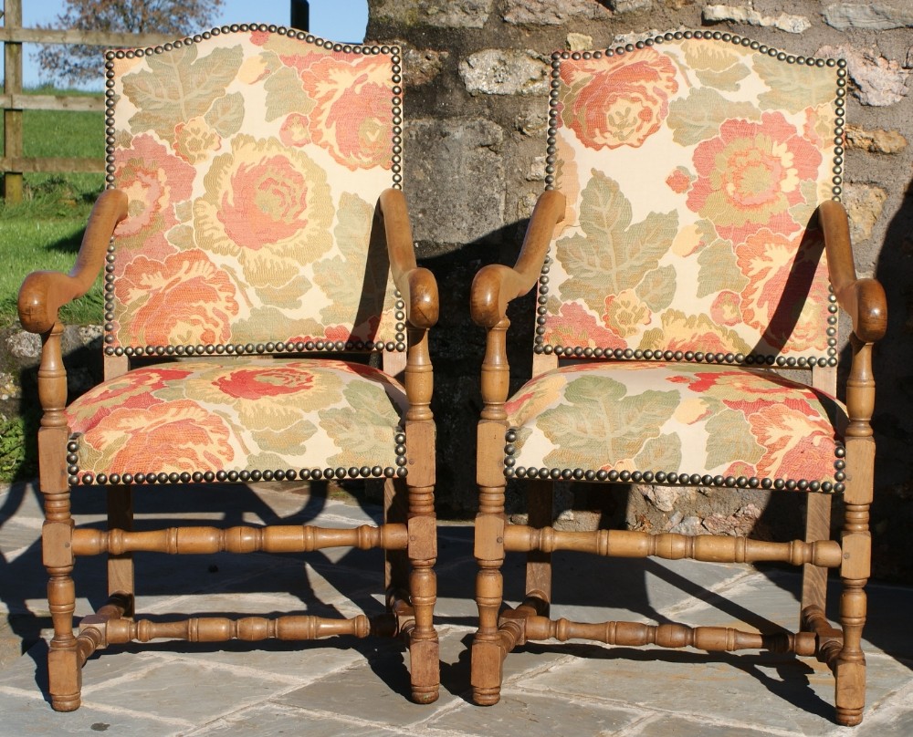 a stunning pair of french upholstered arm chairs
