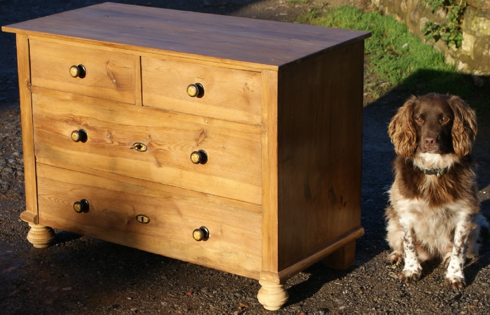 a very pretty stripped pine east german chest of 4 drawers