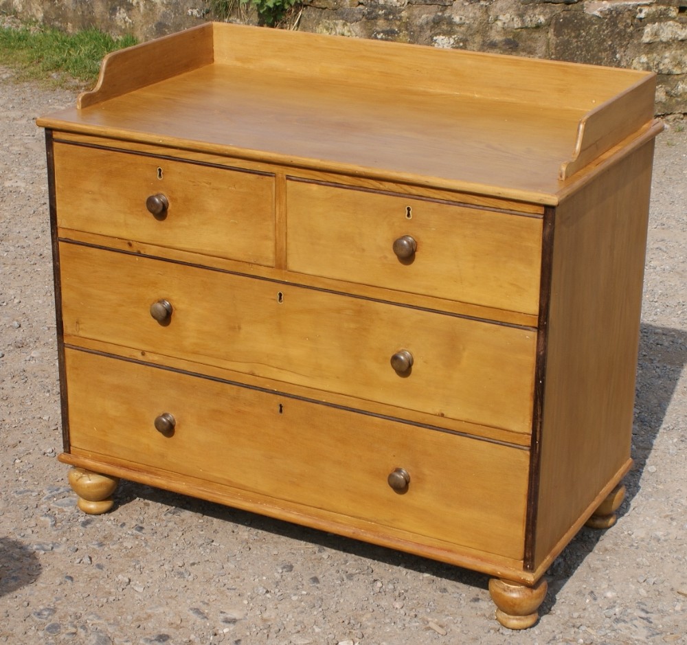 a fantastic victorian stripped pine chest of 4 drawers