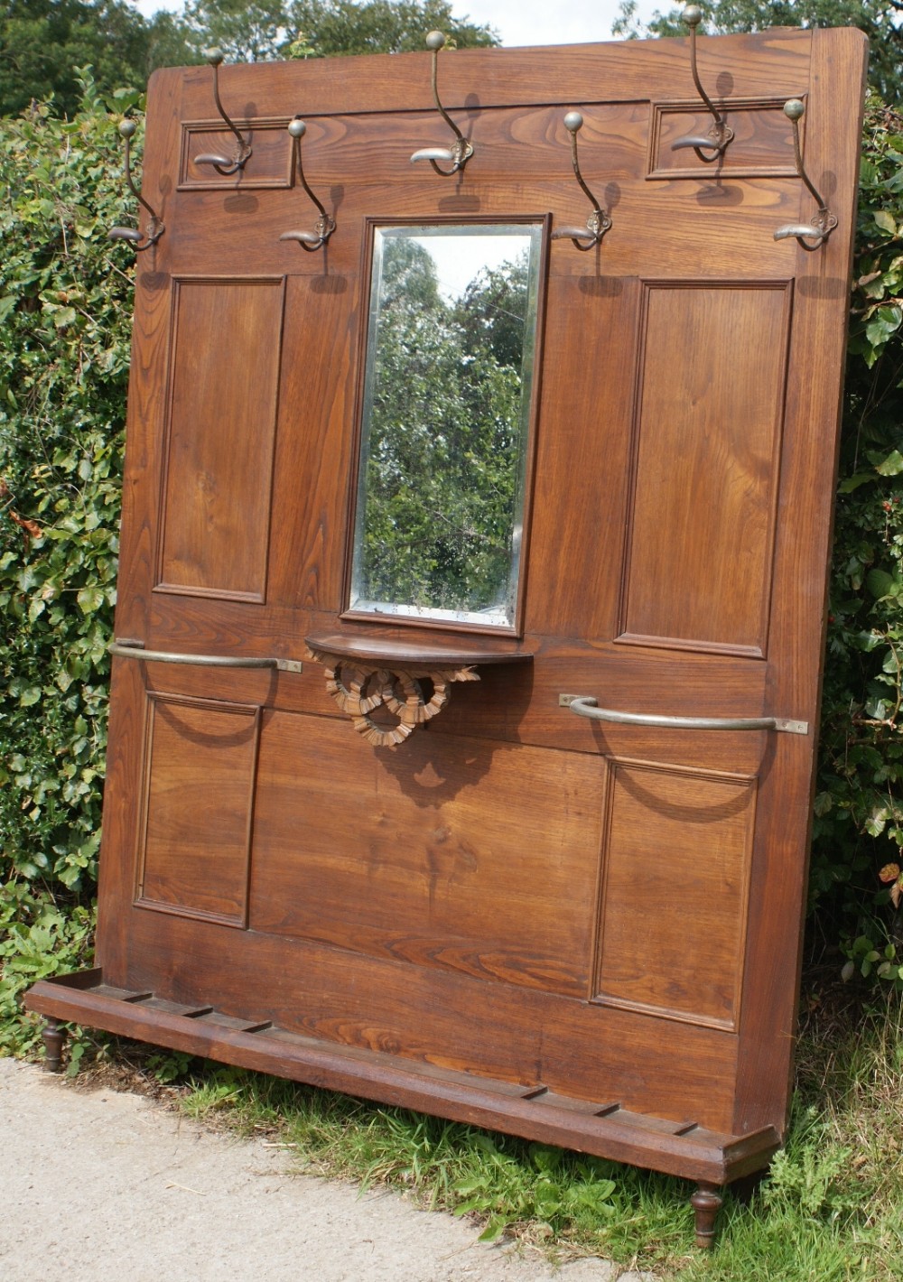 a superb example of a large french chestnut hall stand