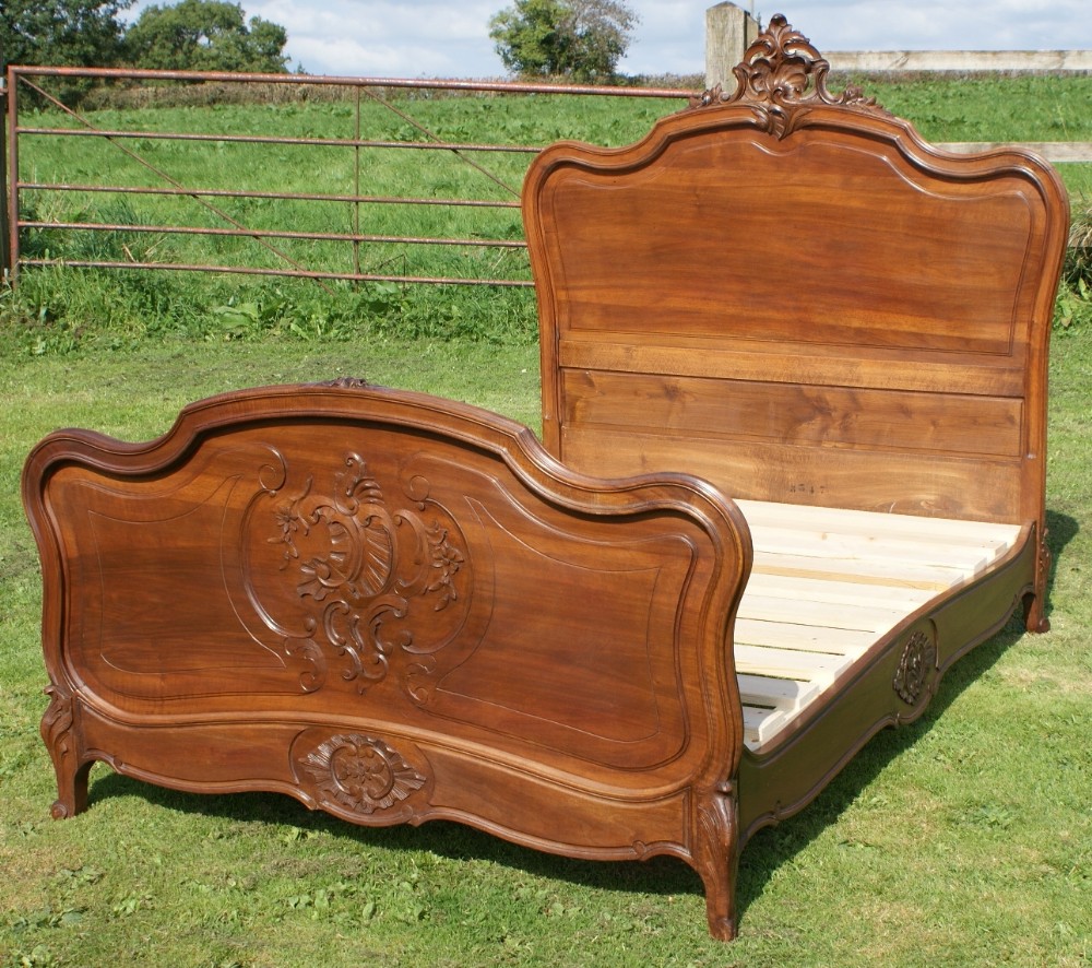 a stunning late 19th century french walnut louis xv style double bed with base