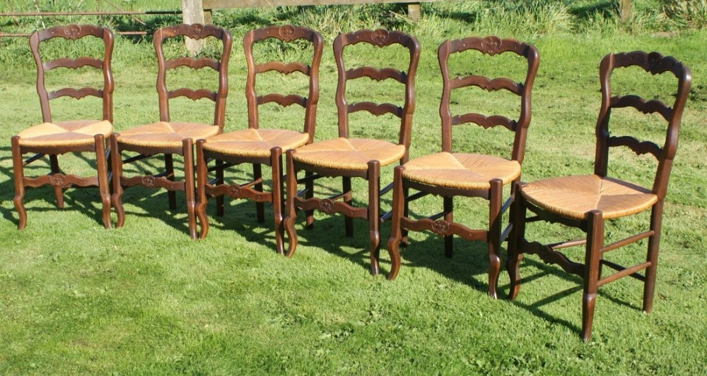 a super set of 6 good strong french oak louis style rush seat dining chairs