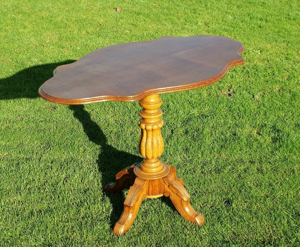 a very pretty late 19th century french oak tilting violin table