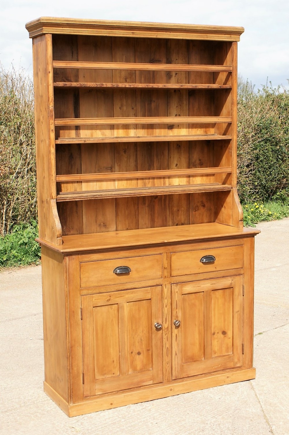 a late 19th century antique english stripped pine dresser